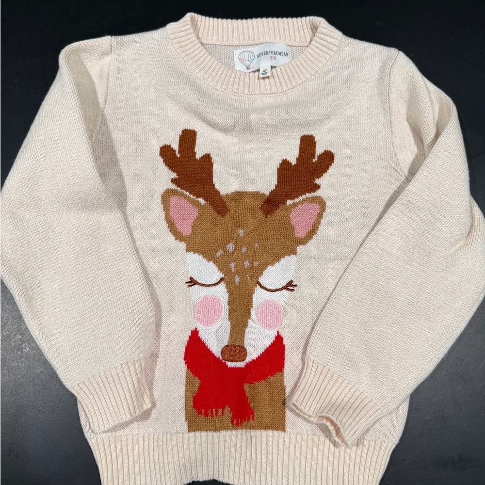 Adorable Cream Sweater with Reindeer Design